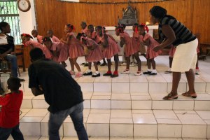 Kindergarten students practicing graduation dance.